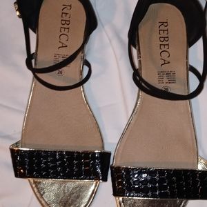 Brand new Rebeca black and gold flats size 10 1/2